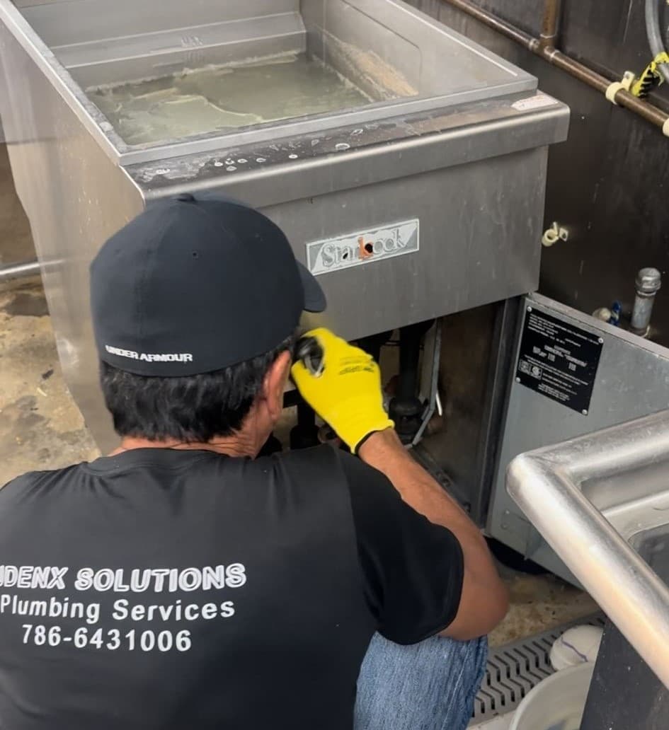 Plumber in Pinecrest working on a project